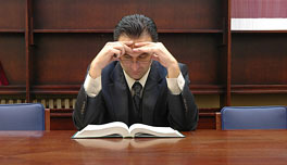 judge reviewing legal documents photo of judge reviewing documents