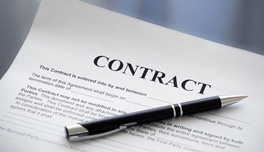contract photo of a contract with a pen